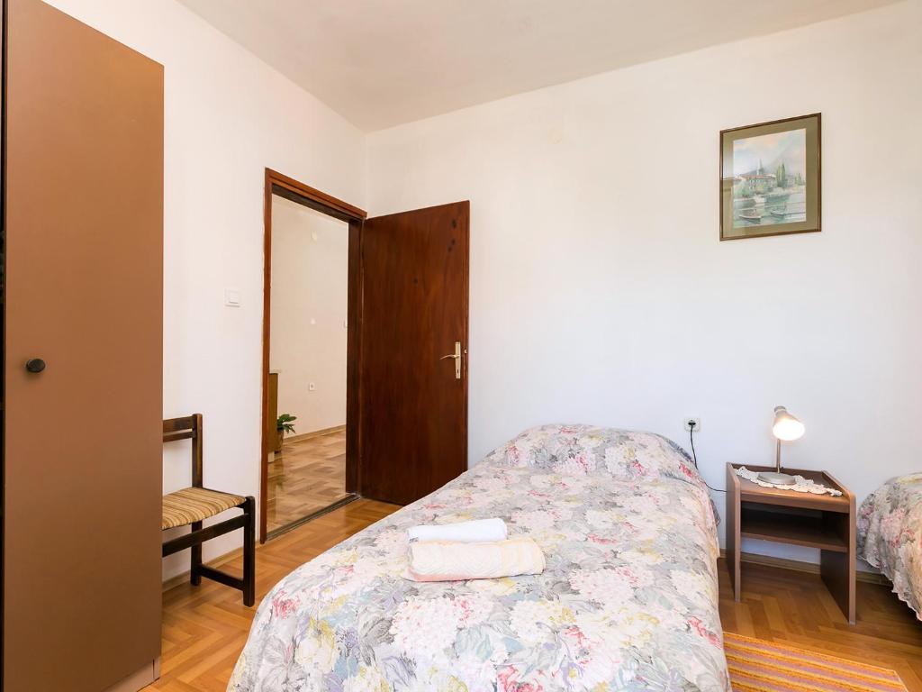 Postel nebo postele na pokoji v ubytování Apartman Šušnjić