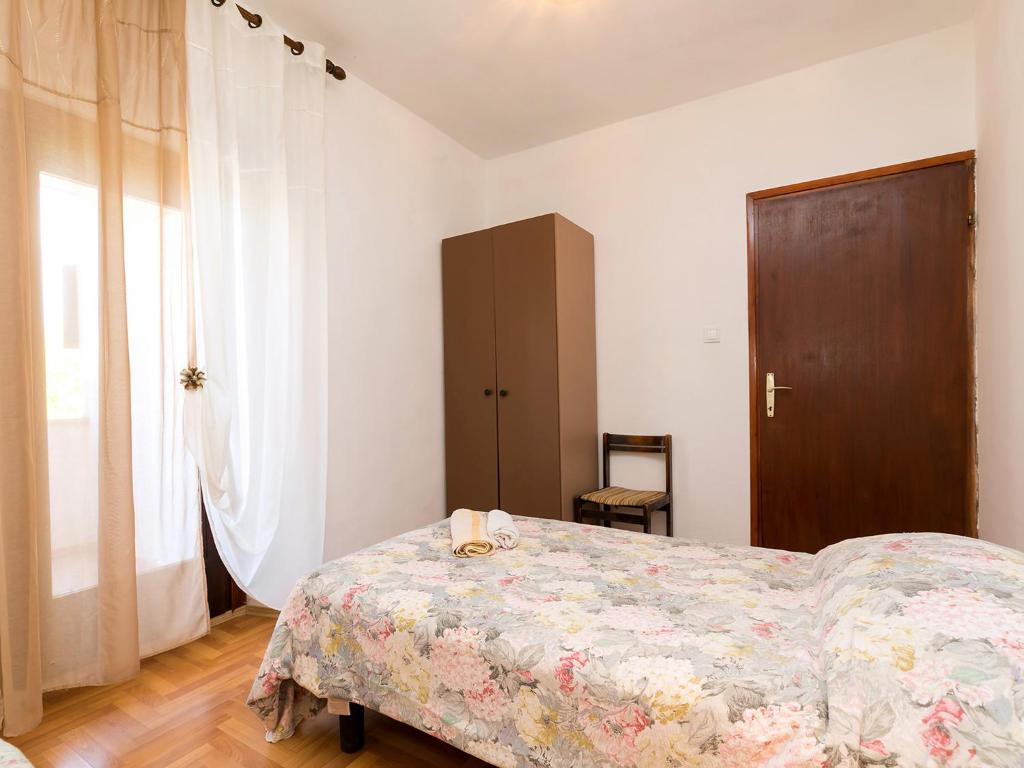 Postel nebo postele na pokoji v ubytování Apartman Šušnjić