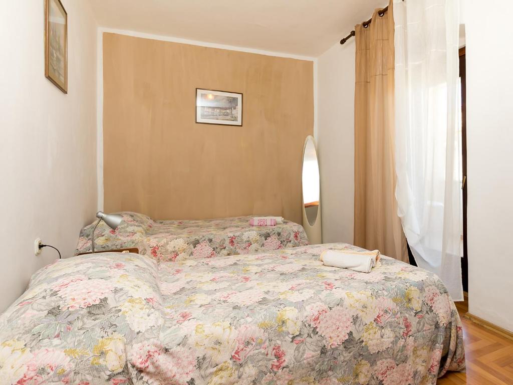 Postel nebo postele na pokoji v ubytování Apartman Šušnjić