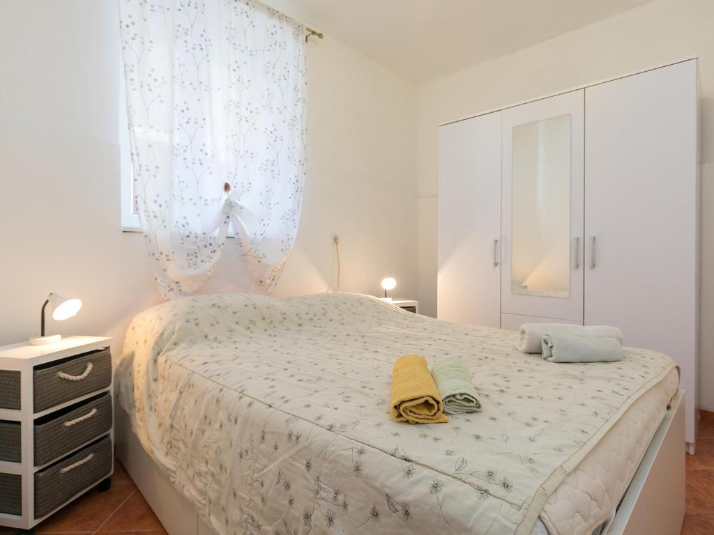 Postel nebo postele na pokoji v ubytování Apartman Šušnjić