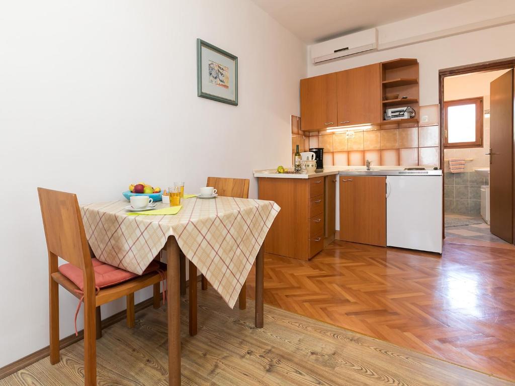 Kuchyň nebo kuchyňský kout v ubytování Apartman Šušnjić