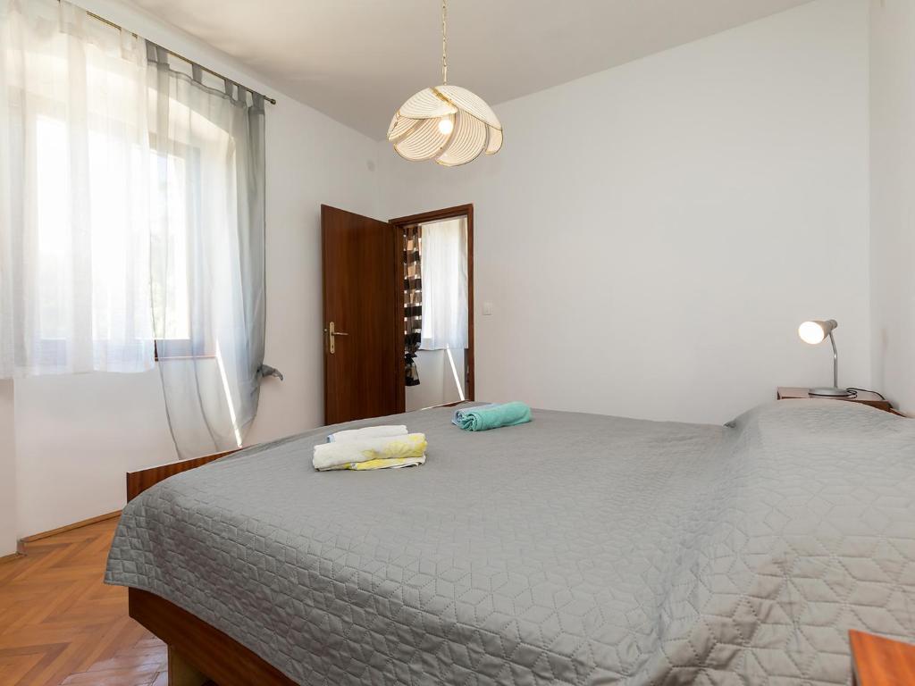Postel nebo postele na pokoji v ubytování Apartman Šušnjić
