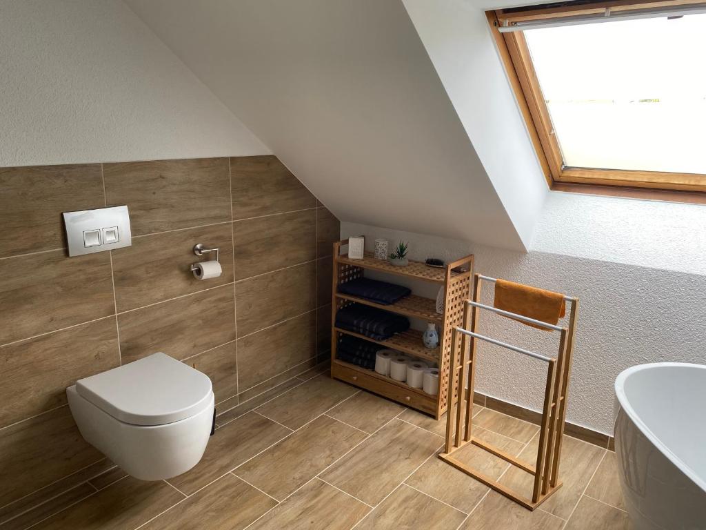Koupelna v ubytování Traumhafte Dachgeschosswohnung