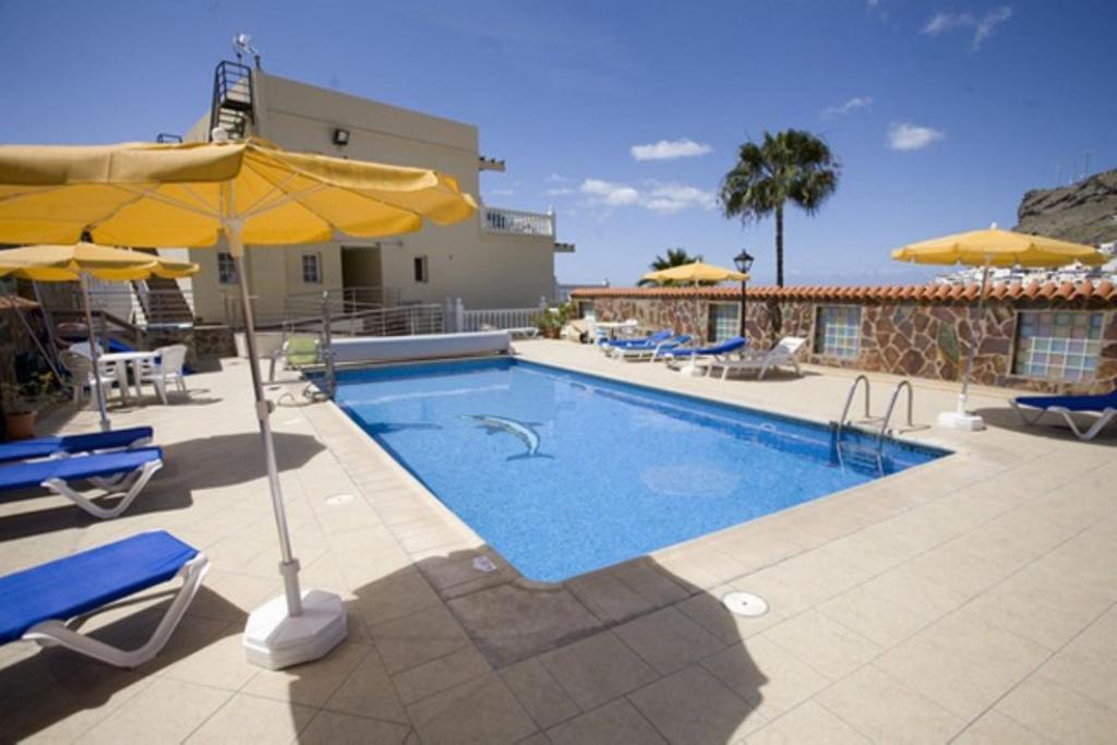 Swimmingpoolen hos eller tæt på Playa De Mogan Mirador 8 by El Sirocco