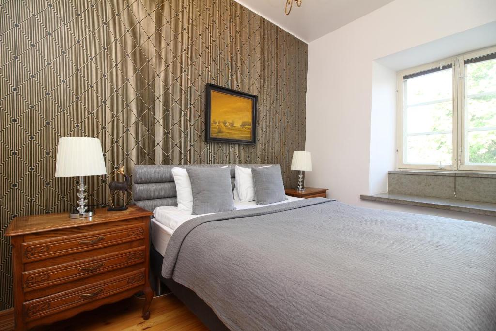 Voodi või voodid majutusasutuse Tallinn City Apartments - Old Town toas