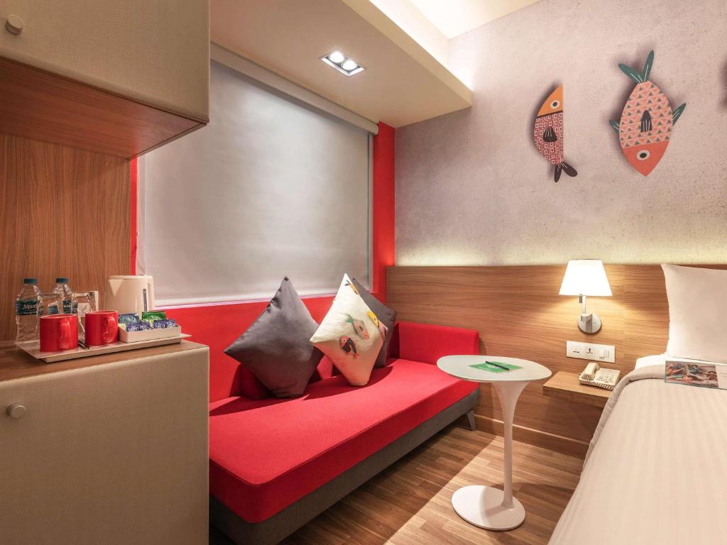 Postel nebo postele na pokoji v ubytování ibis Kolkata Rajarhat - An Accor Brand