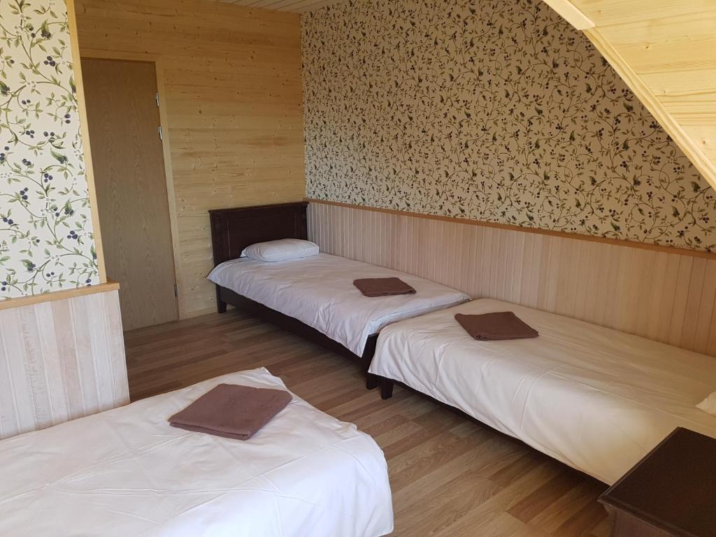 Postel nebo postele na pokoji v ubytování Risti kodumajutus