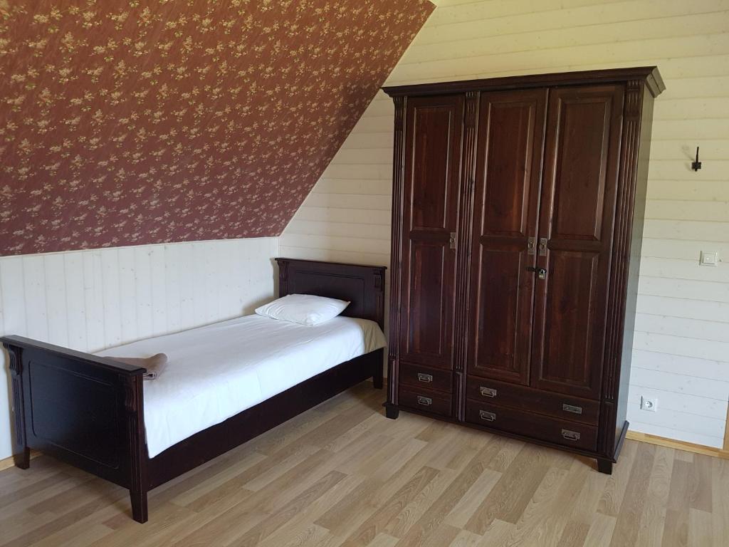 Postel nebo postele na pokoji v ubytování Risti kodumajutus