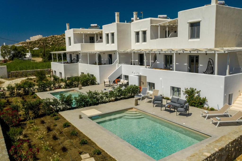 an aerial view of a house with a swimming pool at Salinus Villas in Plaka