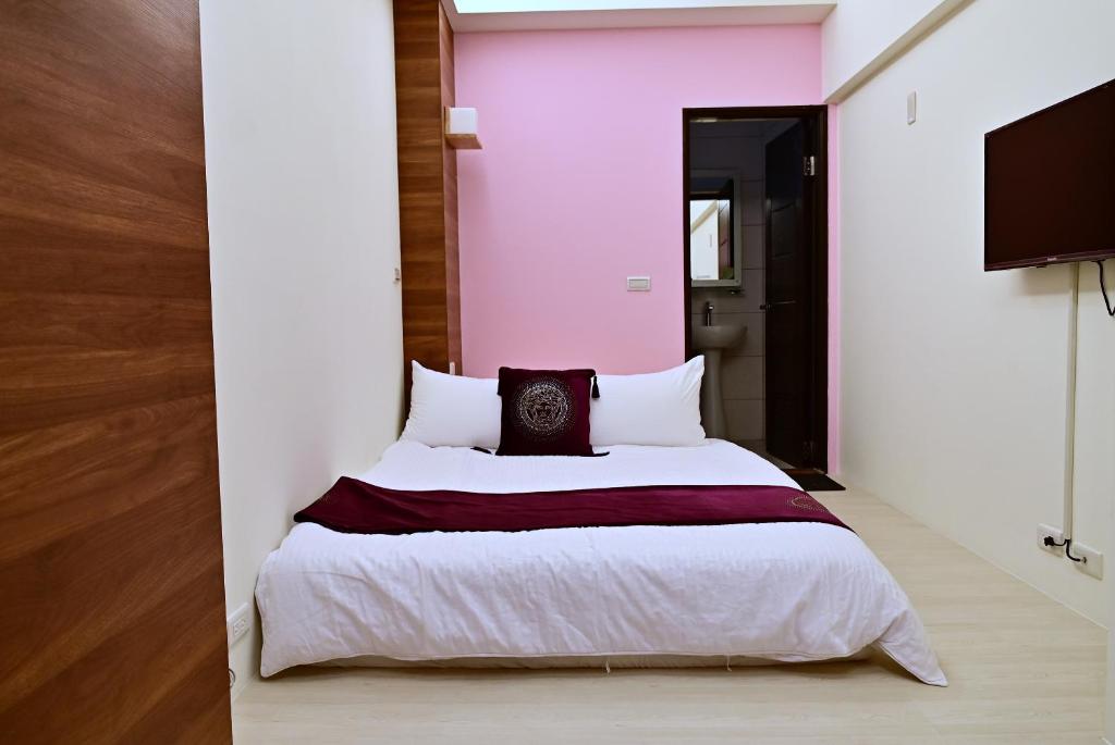 Postel nebo postele na pokoji v ubytování Hotel Yong Cheng