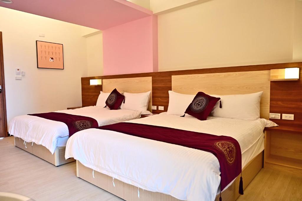 Postel nebo postele na pokoji v ubytování Hotel Yong Cheng