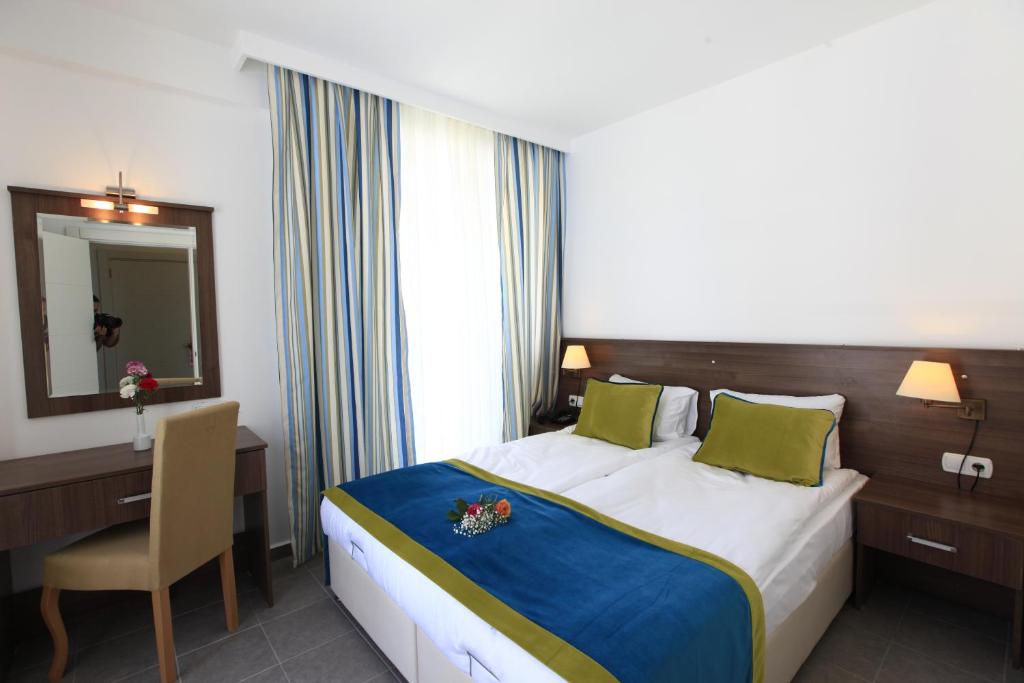 Postel nebo postele na pokoji v ubytování Side Su Hotel - Adult Only (+16)