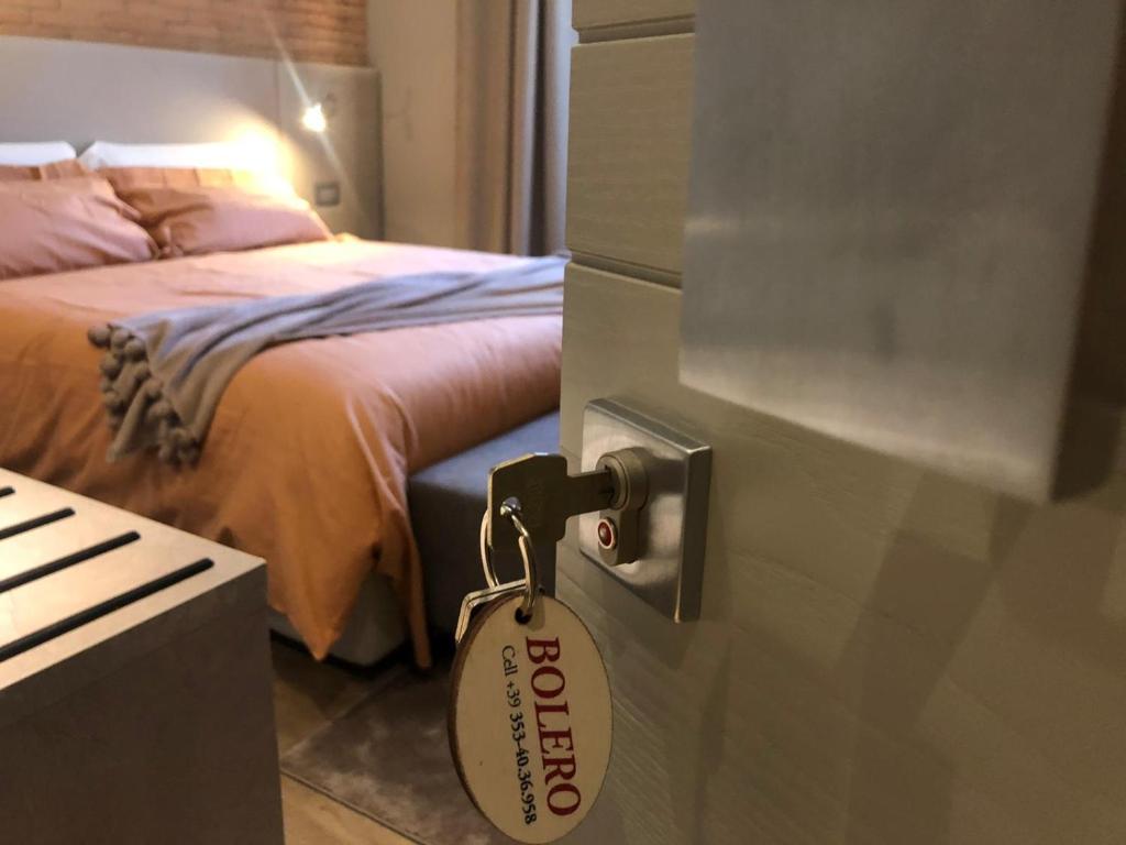 Łóżko lub łóżka w pokoju w obiekcie La Linea d’Acqua (SP)