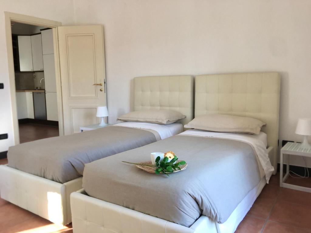 Posteľ alebo postele v izbe v ubytovaní La casa di Giulia Apartment with air conditioning, wifi and private parking