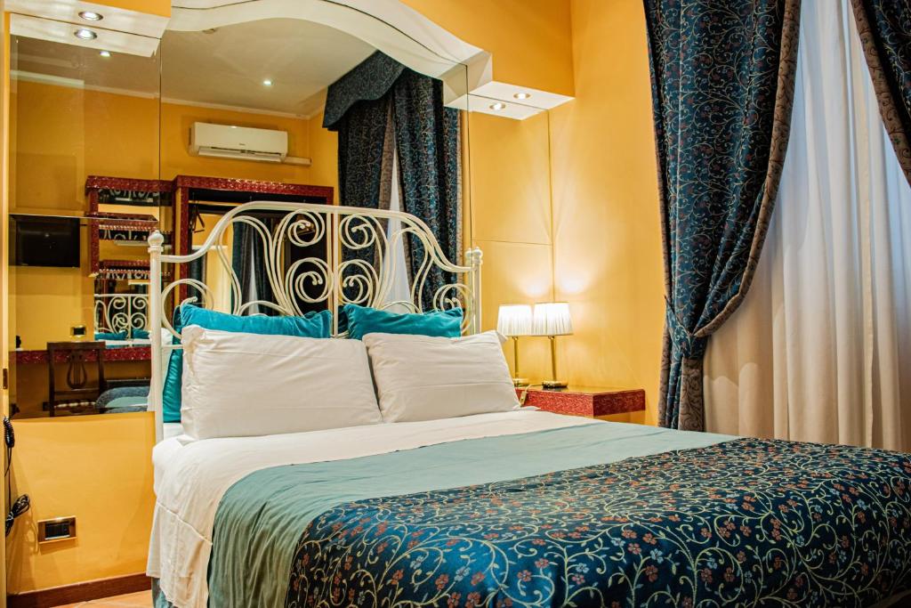 Cama ou camas em um quarto em Hotel Canova