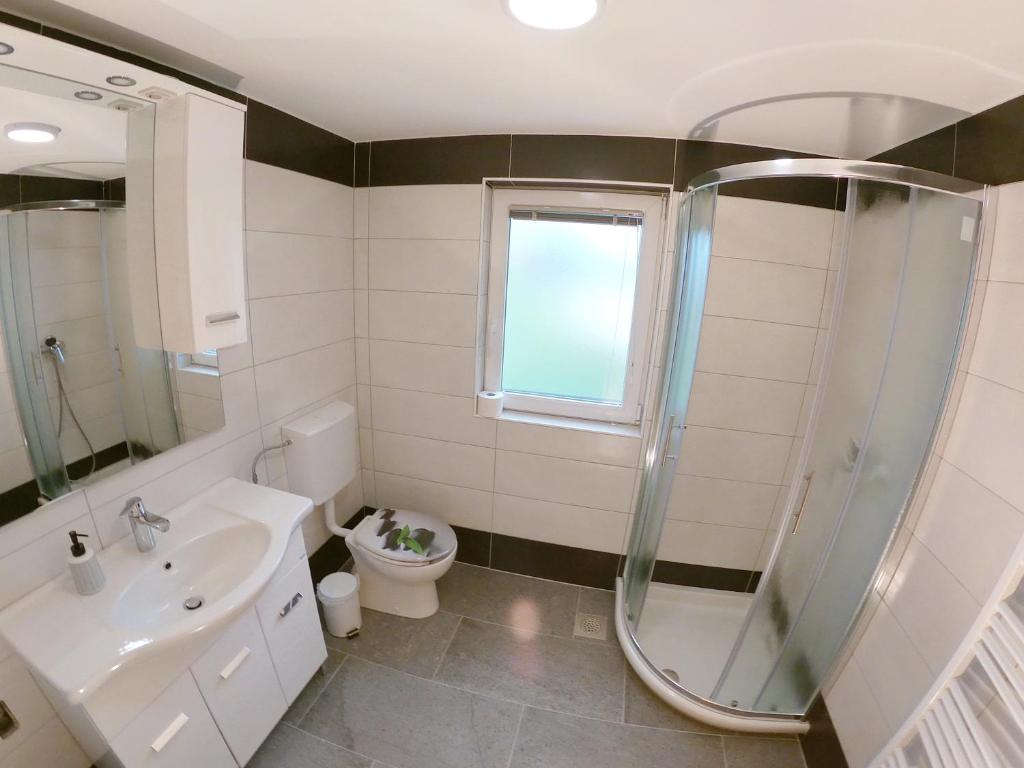 Koupelna v ubytování Apartments Laura FARM STAY