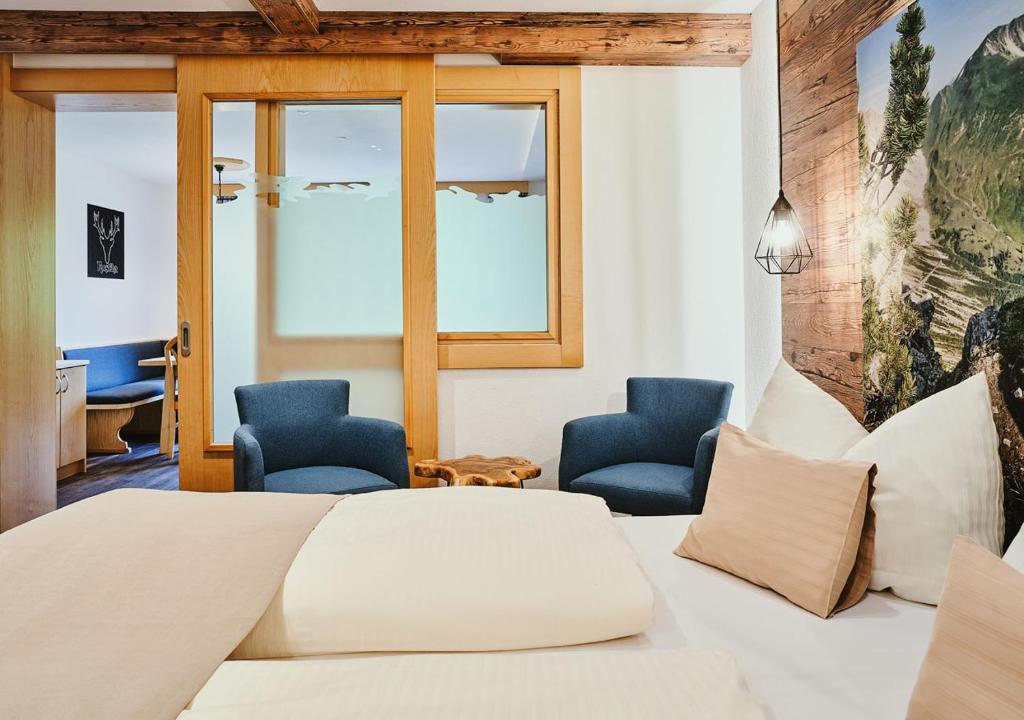 Postel nebo postele na pokoji v ubytování Hotel Rustika