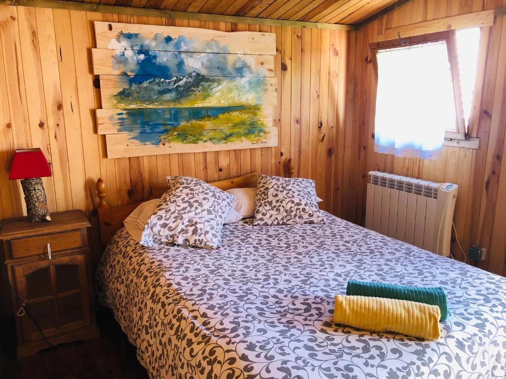 Cama o camas de una habitación en La Posada Cercedilla