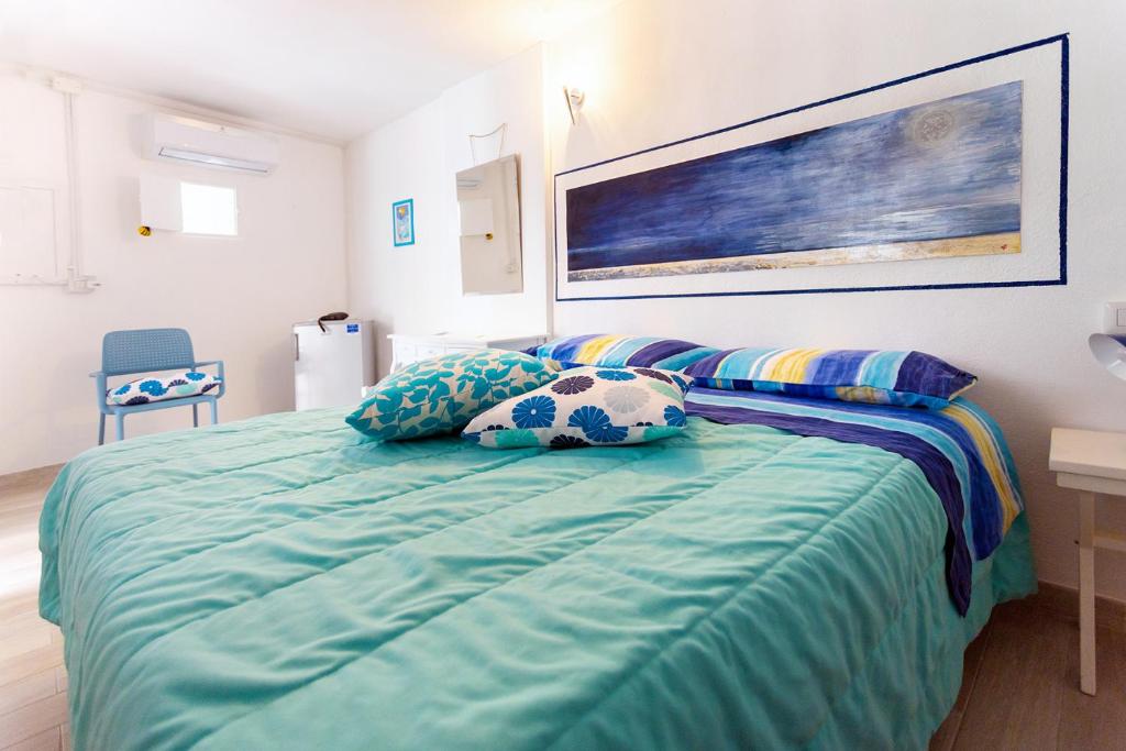 Postel nebo postele na pokoji v ubytování B&B Auliv