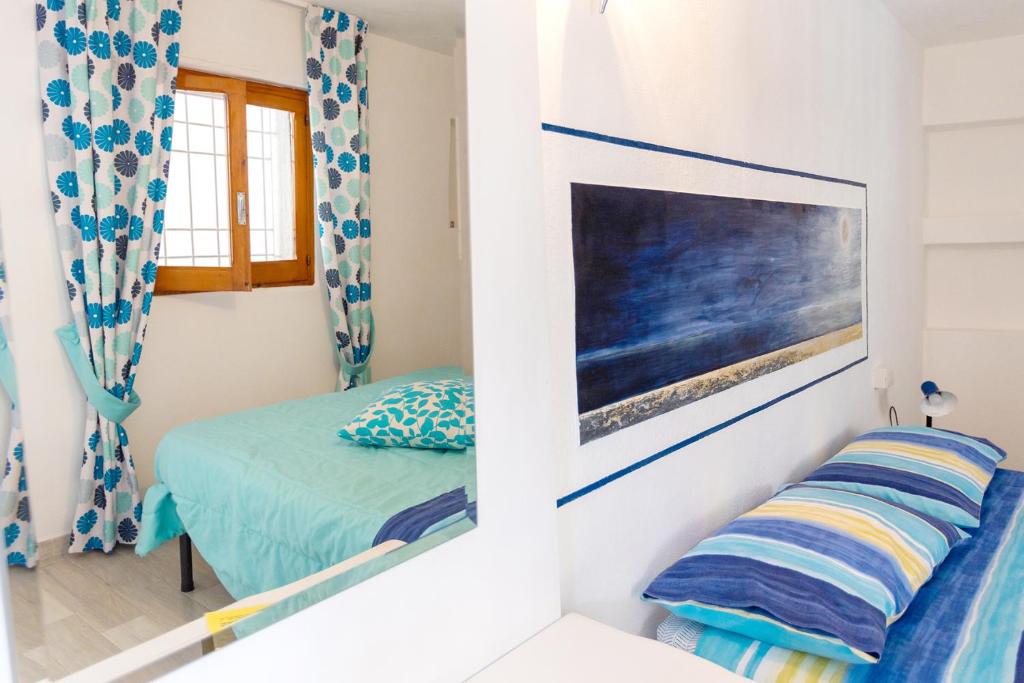 Postel nebo postele na pokoji v ubytování B&B Auliv