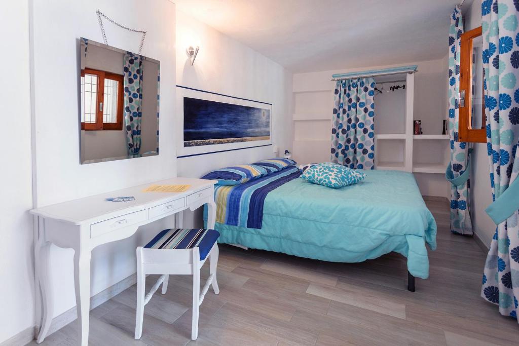 Postel nebo postele na pokoji v ubytování B&B Auliv