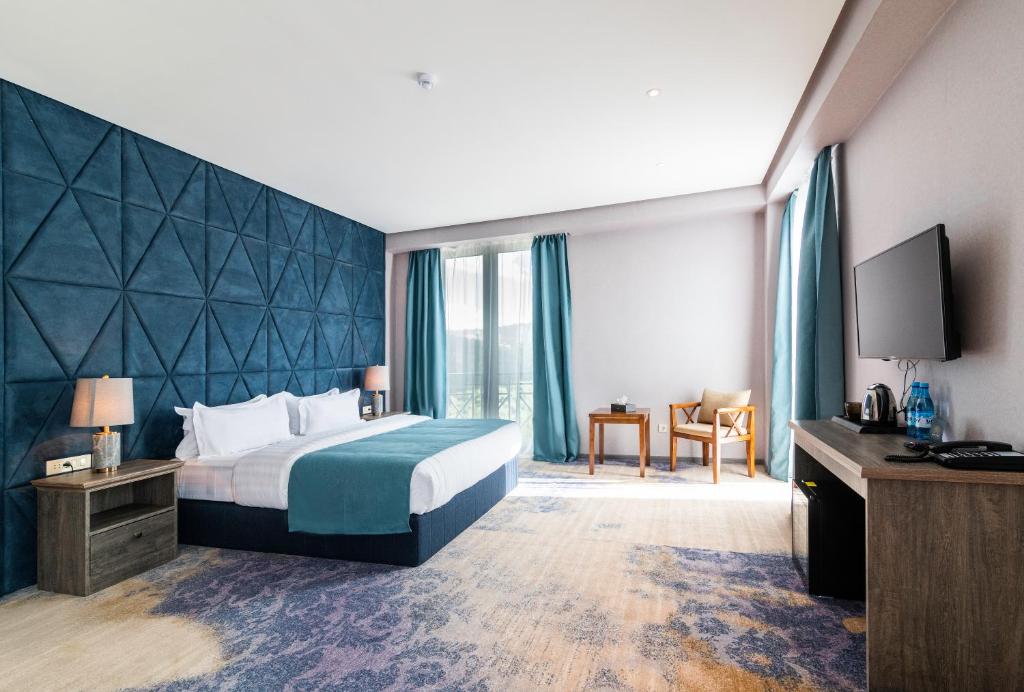 Postel nebo postele na pokoji v ubytování Aurora Resort, Tsaghkadzor