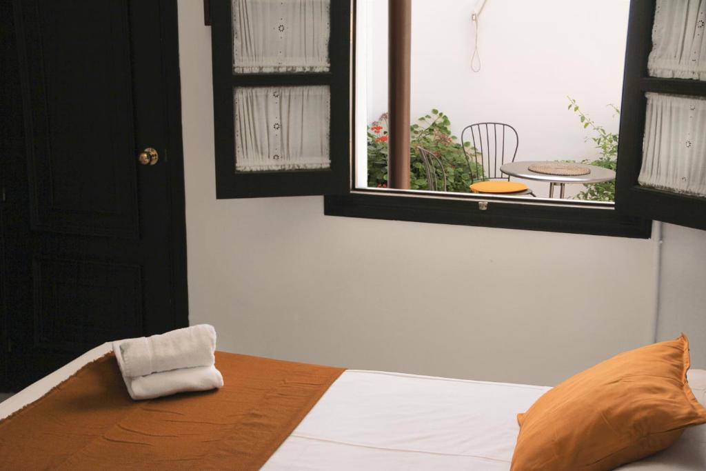 Posteľ alebo postele v izbe v ubytovaní La Piquera Hostal