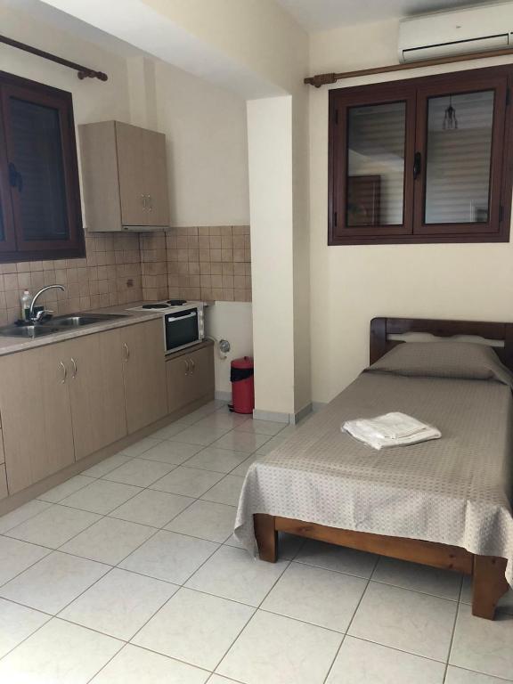 Kuchyň nebo kuchyňský kout v ubytování Savvas Apartments