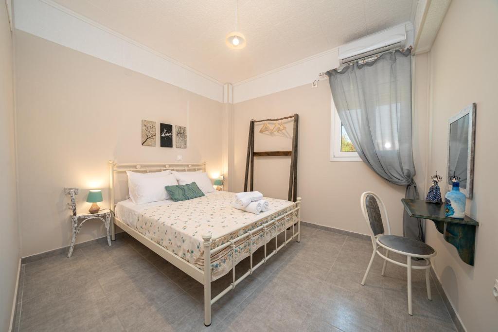 Postel nebo postele na pokoji v ubytování Casa di Colona - Μπλε
