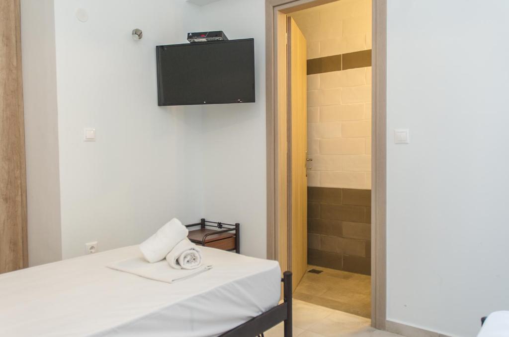 TV a/nebo společenská místnost v ubytování Tasos Rooms