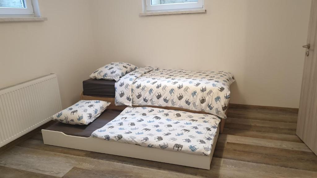 Postel nebo postele na pokoji v ubytování Apartma Claudia