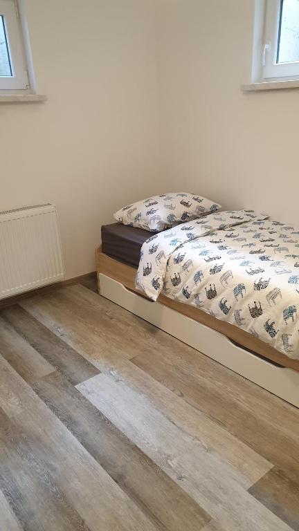 Postel nebo postele na pokoji v ubytování Apartma Claudia