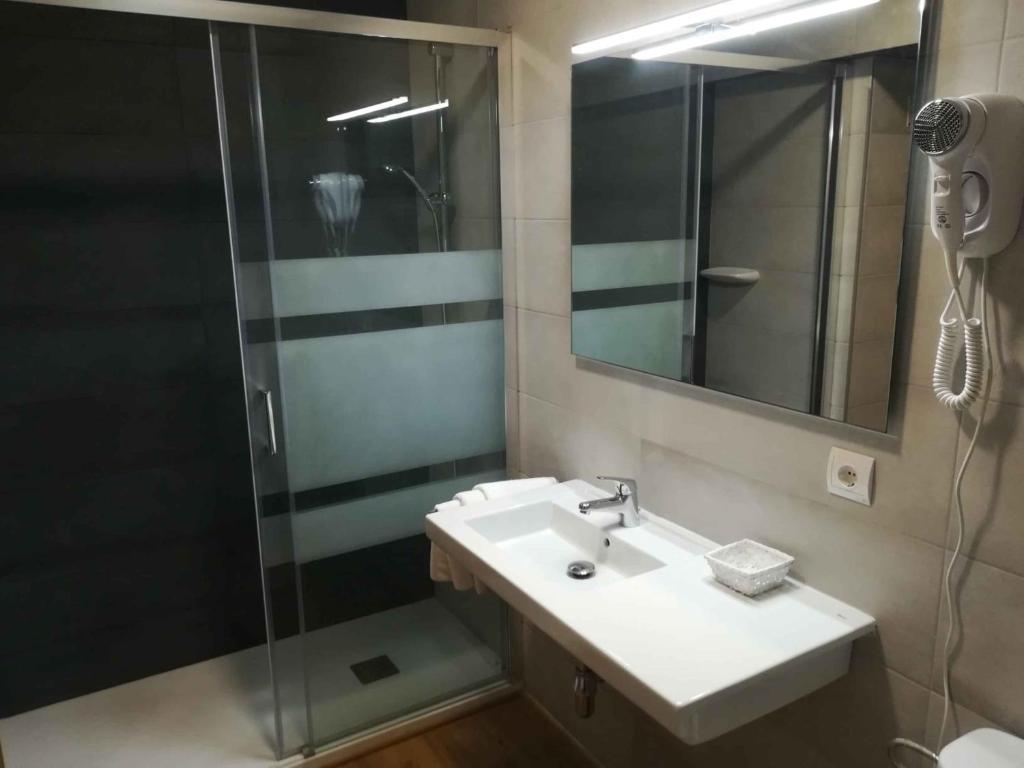 Koupelna v ubytování Hotel Vicente