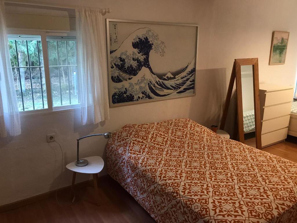 Postel nebo postele na pokoji v ubytování Chalet con Piscina - LAS ADELFAS