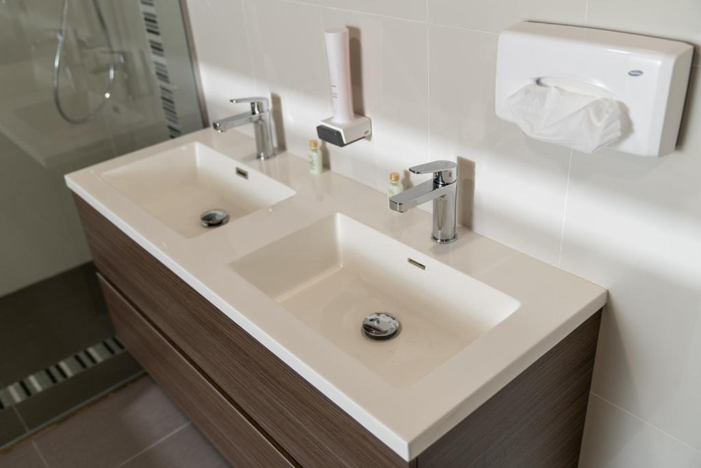 Koupelna v ubytování Hotel Kristály Konferencia & Wellness