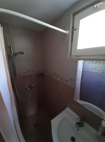 Kúpeľňa v ubytovaní Fortuna Apartmanházak