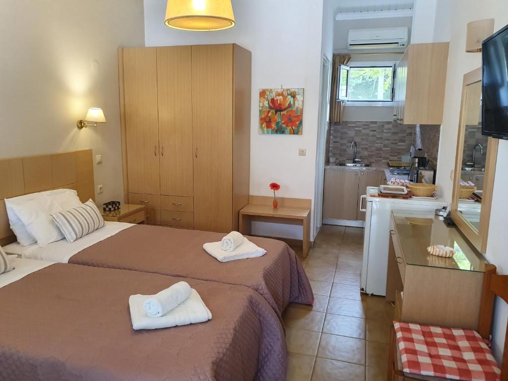Posteľ alebo postele v izbe v ubytovaní Daglas Seaside Studios