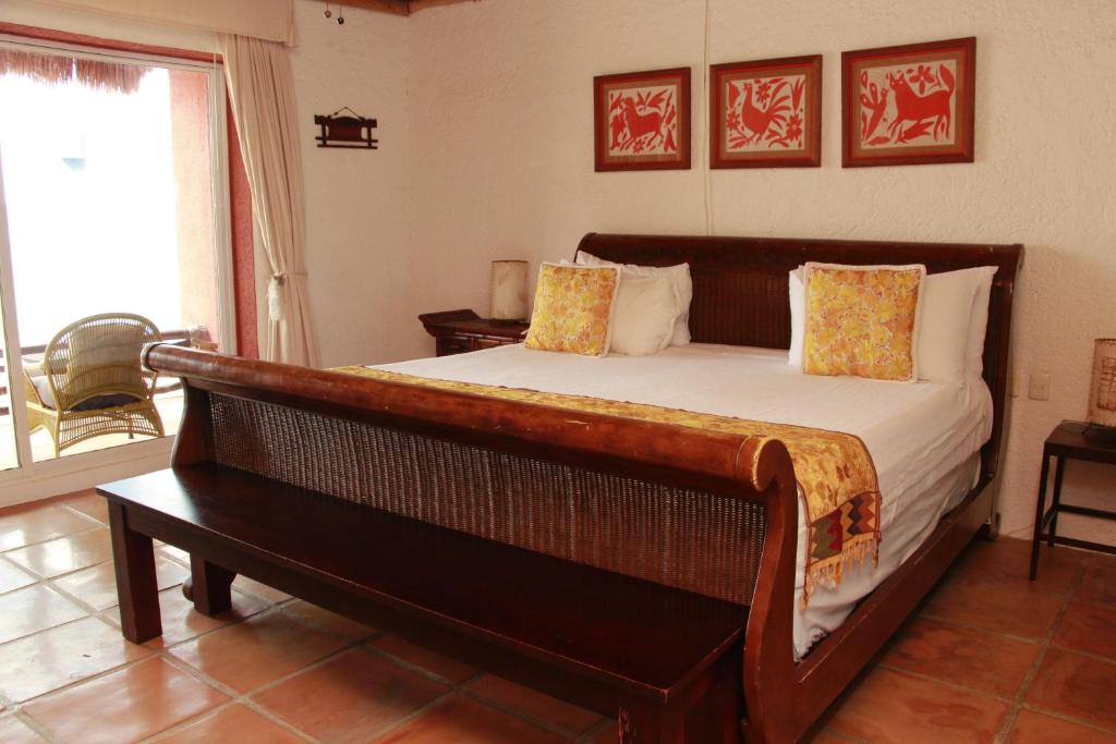 Postel nebo postele na pokoji v ubytování Casa de los Sueños Hotel Boutique