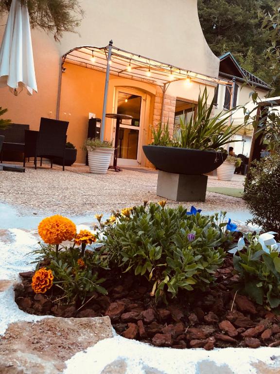 Zahrada ubytování Hôtel Le Moulin D'Olt