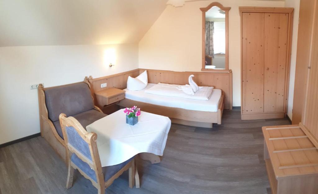 Postel nebo postele na pokoji v ubytování Hotel Igelstadt