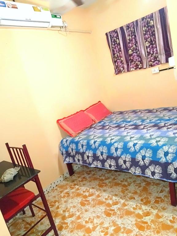 Postel nebo postele na pokoji v ubytování Pleasant Inn