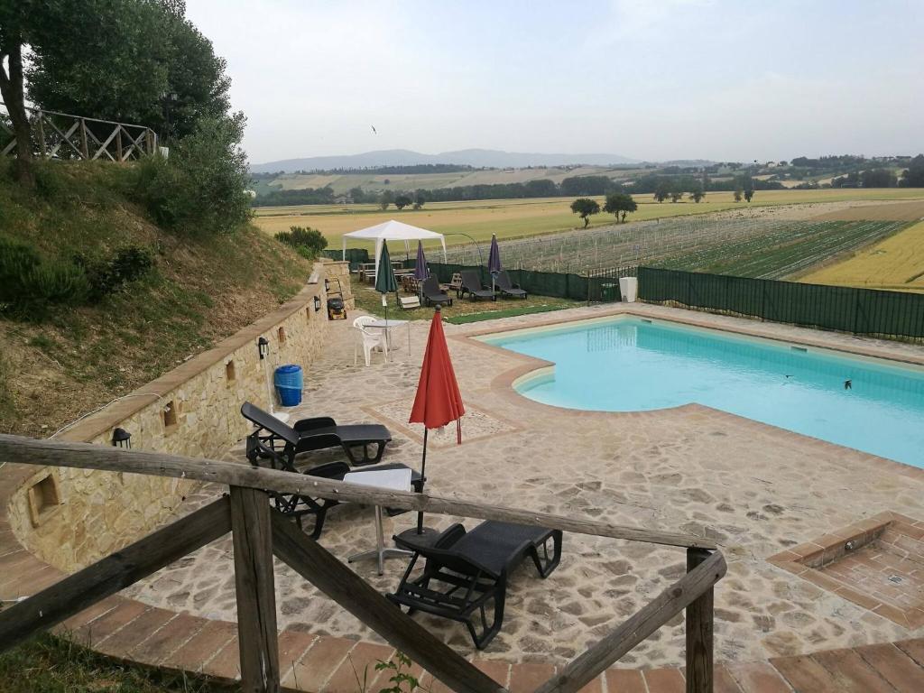 Kép Camera Matrimonialedoppia Con Balcone Vista Piscina szállásáról Monte Molinóban a galériában