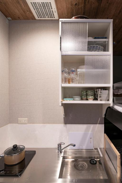 Kuchyň nebo kuchyňský kout v ubytování Room Inn Shanghai 横浜中華街 Room 2