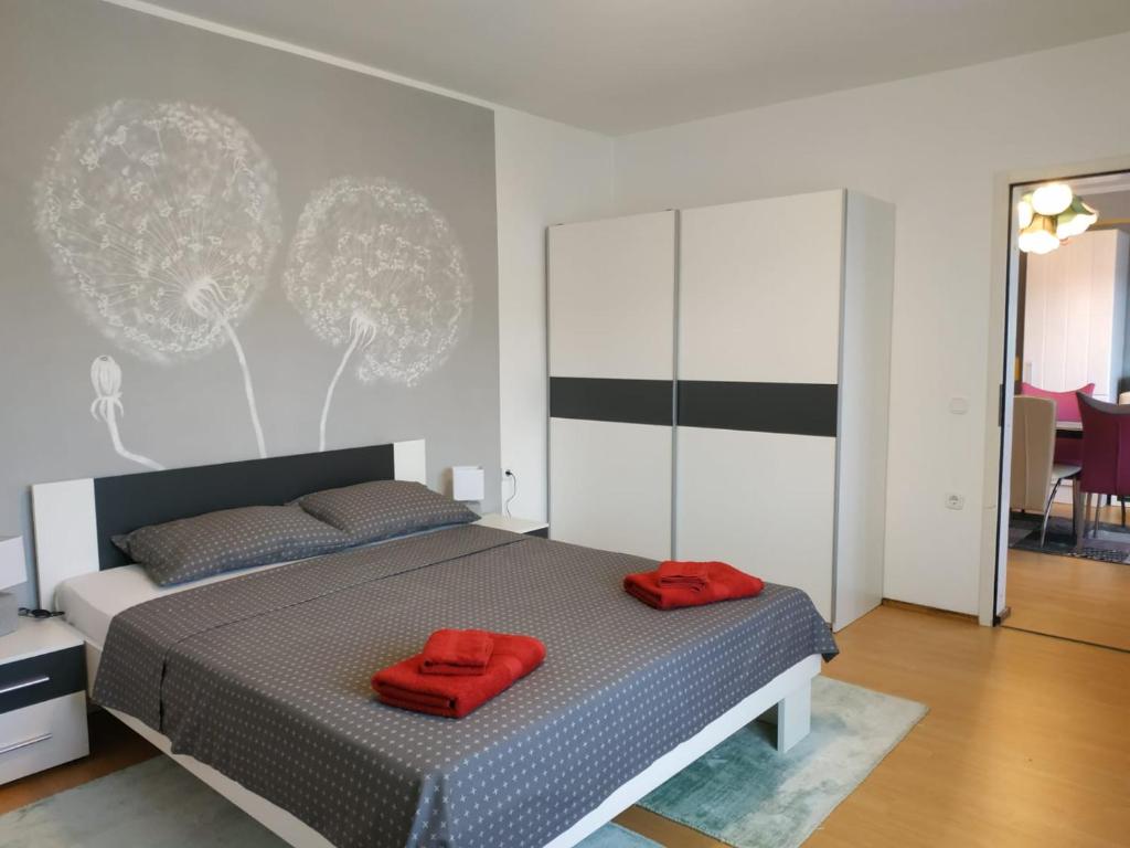 A bed or beds in a room at Apartmaji Sofia