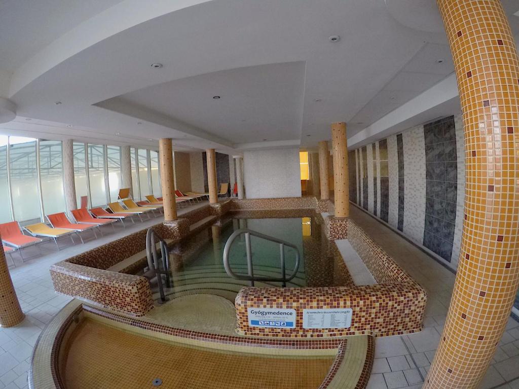 The swimming pool at or close to Relax and Spa - DeLux Apartman