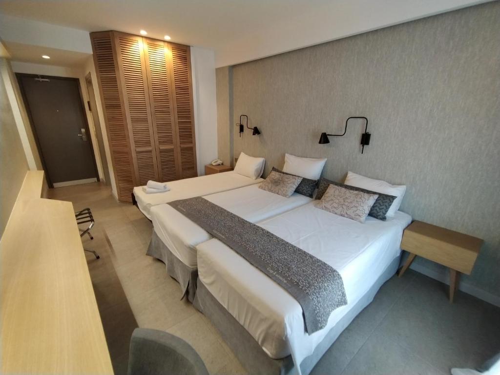 Twin Room with Extra Rollaway Bed with Mountain View Minoa Hotel