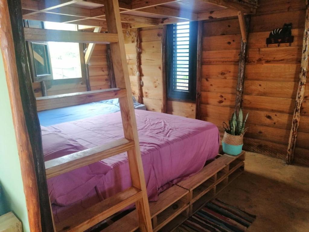 Ein Bett oder Betten in einem Zimmer der Unterkunft GuaiGüí Bayahibe