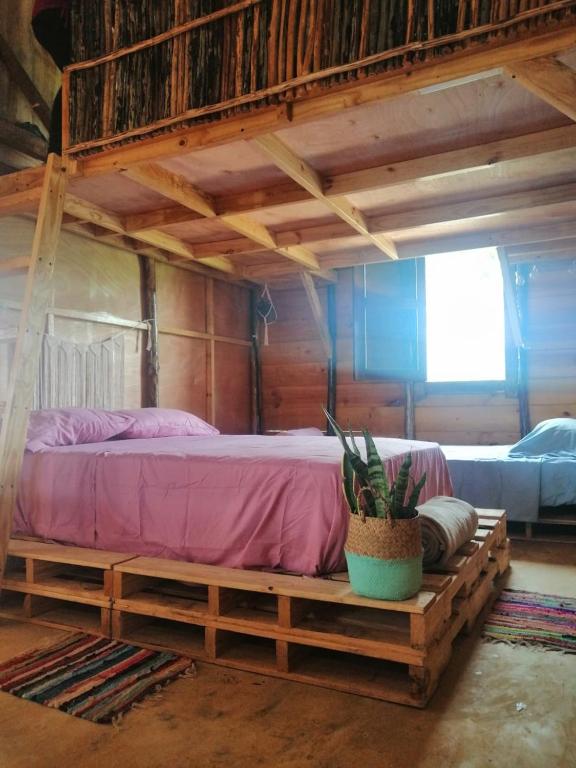 Ein Bett oder Betten in einem Zimmer der Unterkunft GuaiGüí Bayahibe