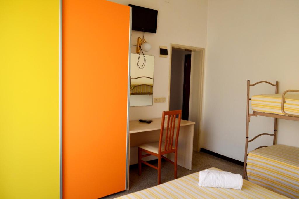 Postel nebo postele na pokoji v ubytování Hotel Cirene
