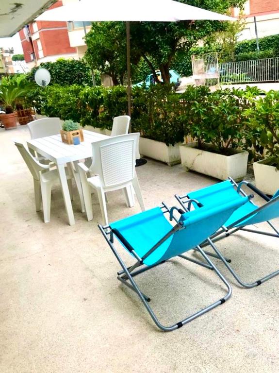 Patio alebo iná vonkajšia časť ubytovania Ad un passo da Serapo